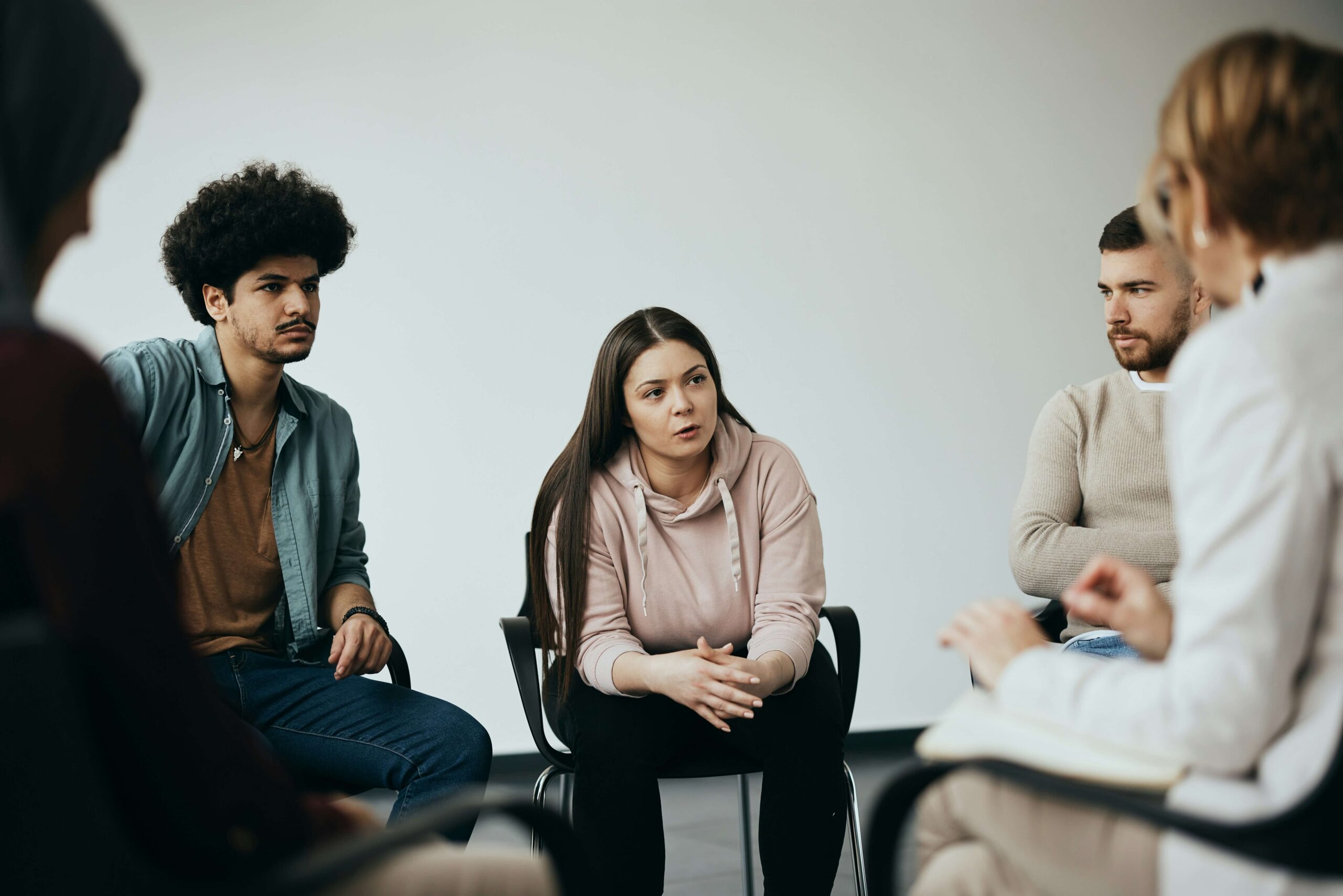 Group of people sitting around talking
